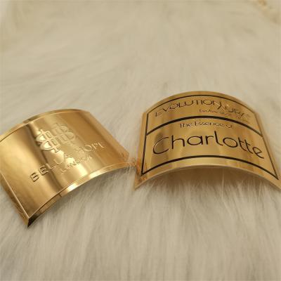 China Ranking Metallic Brand Label With Embossed Finished Of Perfume Bottle Body Package Printing Label for sale