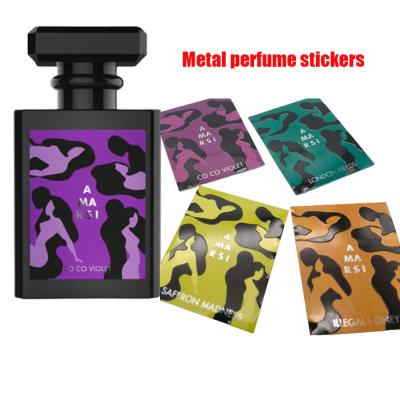 China Cold Stamping Perfume Metal Sticker Custom Silver Badge Roll Paper Printing Packaging Bottle Gold Foil 3D Emboss Label for sale