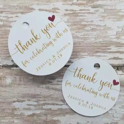 China New Design Embossed Hang Tag Especial String Presente PVC Hangtags Etiquetas de Vestuário à venda