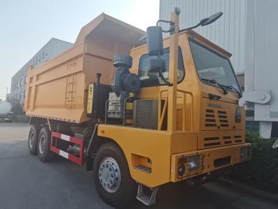 China SINOTRUK Tipper Dump Truck resistente LHD com amarelo de esqueleto de grande resistência unilateral do táxi à venda