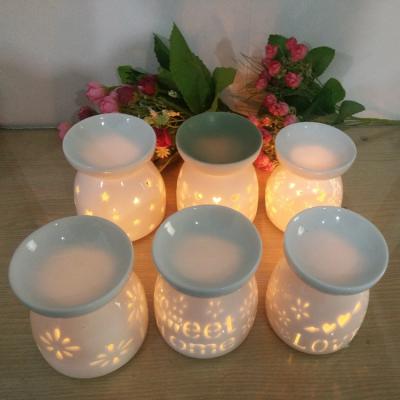 China Chinese European Ceramic Wholesale Home Tea Candle Crafts Style Oil Burner Luxury Incense Essential Oil Burner Set Light Set for sale