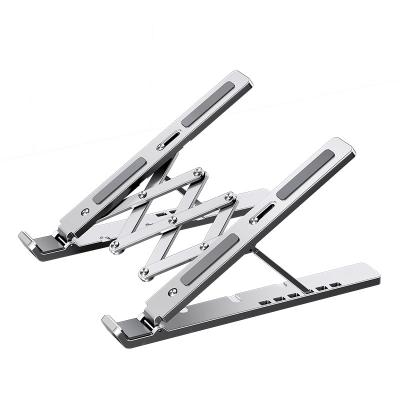 China Suitable 2023 X Shaped Height Adjustable Computer Holder Higher Bracket Portable Foldable Ergonomic Aluminum Laptop Stand for sale