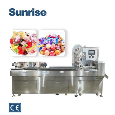China SR1000 High Speed Servo Driven Small Candy Packing Machine Food One Piece Candy Pillow Type Price for sale
