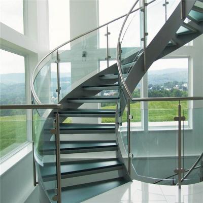 China Modern Customized Two Story Round Glass Staircase / Modern Curved Stainless Steel Stair Grille Designs for sale