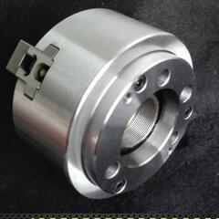 China KM Four jaw hollow center chuck This type with the features of heavy pressure cutting en venta