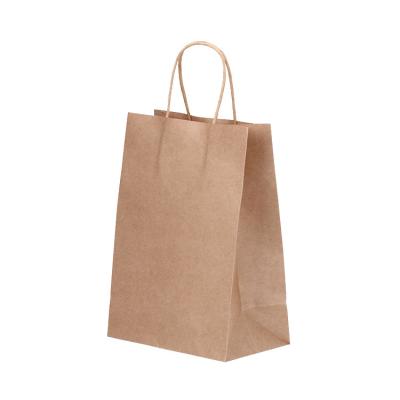 China Custom Made Eco - Friendly Biodegradable Kraft Paper Bag Gift Packaging Bag With Handle for sale