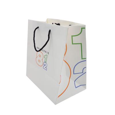 China New Fashion Customized Logo Quality-Assured Recyclable Printed Brown Kraft Handle Washable Kraft Bag for sale