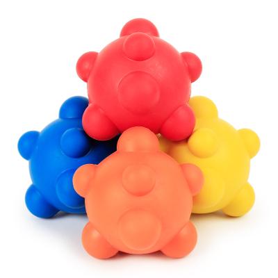 China Stocked Popular Creamy Rubber Dog Toys Irregular Chew Toy Fun Bite Resistant Dog Toy Ball Bouncing Ball 7cm Dog Toy for sale
