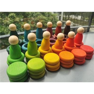 China 100% Eco-Friendly Wooden Stacking Coins and Blocks Rainbow Rings with Peg Dolls Loose Parts Toy for Kids Open-Ended Play for sale
