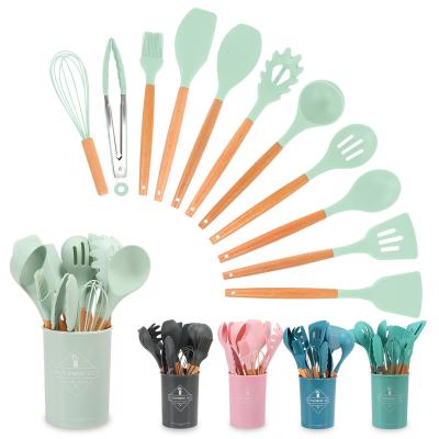 China Sustainable kitchen utensils set useful silicone 12 accessories set and stainless steel pots and pans for sale