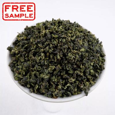 China FREE SAMPLE Natural/High Quality China Fujian Guan Yin Oolong Tea Link Leaves With High Quality Peach Roasted Oolong Tea Taiwan Organic Oolong Tea for sale