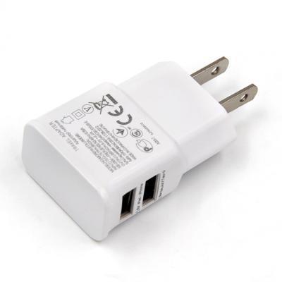 China Main Charger Factory Supply New Design Quality Mobile Phone Charger Dual USB Wall Charger for sale