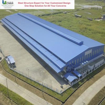 China Schiebetür Erdbebenbeständig Portable Vorgefertigte Vorgefertigte Montierte Schwere Bogen Metall Gebäude Stahl Struktur Rahmen Werkstatt Lager zu verkaufen