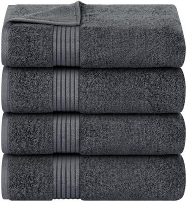 China Luxury Plushy dobby border premium bath towels 100% cotton for sale