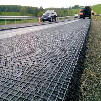 China 15-100kN/m Tensile Strength Steel Plastic Geogrid For Soil Reinforcement for sale