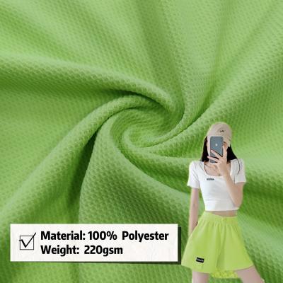 China Wicking High Quality 100% polyester Waffle Fabric Fashion Garment Material Mesh Sportswear Fabric for T-shirt Skirt Uniform for sale