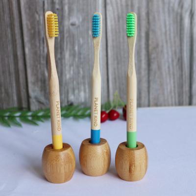 China Hotel Private LOGO Eco - Friendly Charcoal Stiffens Bamboo Toothbrush With Holder for sale