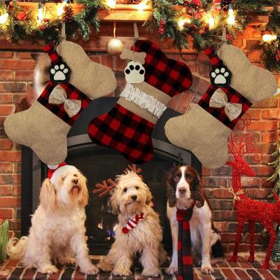 China Dog Paw Plaid Cloth Christmas Shoes Christmas Ornament Pet Elements Dog Christmas Decorations Christmas Socks Gift Bag for sale