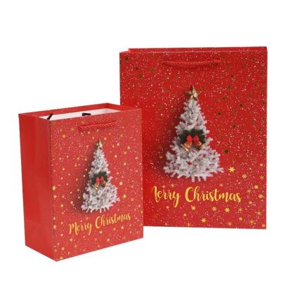 China Custom Printing Patterns Excellent Quality Recyclable Holiday Luxury Shopping Gift Christmas Wrapping Paper Bags With Handles for sale