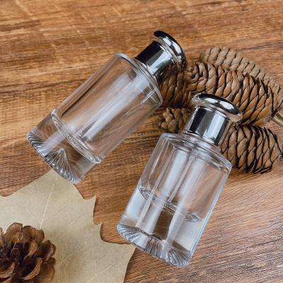 China Personal Care Luxury Custom Cyclindrical Spray Pump 25ml 50ml Glass Empty Perfume Bottle for sale