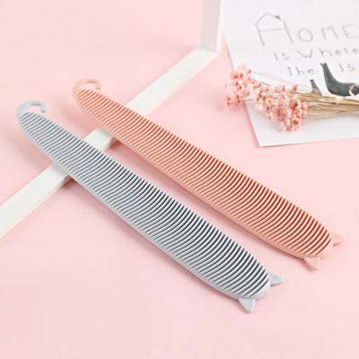 China Viable Pet Cat Tongue Texture Design Massage Comb To Clean And Remove Floating Cat Fur Cat Supplies Portable Multi-Purpose Comb for sale