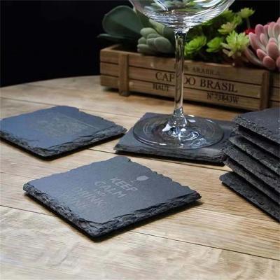 China Custom Stone Drink Coasters Black Natural Edge Slate Stone Plate For Bar And Home for sale
