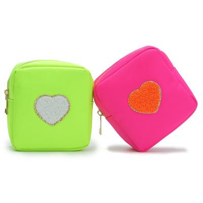 China New Fashion Candy Color Nylon Running Pouch Cosmetic Bag Can Be Customized With Bursting Heart Chenille Letter Patches Pouch for sale