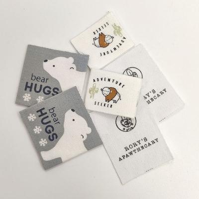 中国 名前の注文の刺繍された衣類の赤ん坊は綿のテープによって印刷される注文の編まれたロゴのラベルを分類する 販売のため