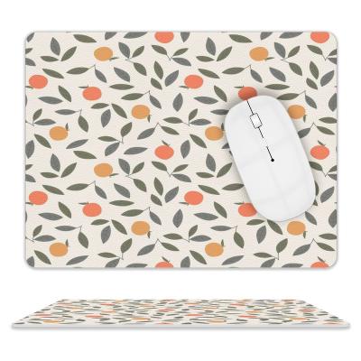 China Water Resistance Orange And Cute Leaves Pattern Mouse Pads for sale
