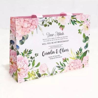 China FUHING China Recyclable Style Luxury Boutique Gift Bag Packaging Pink Floral Pattern Custom Paper Bag With Ribbon Handle for sale
