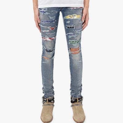 China Slim fit denim fabric man pants patchwork distress blue stacked skinny trousers stacked skinny trousers ripped custom mens jeans for sale