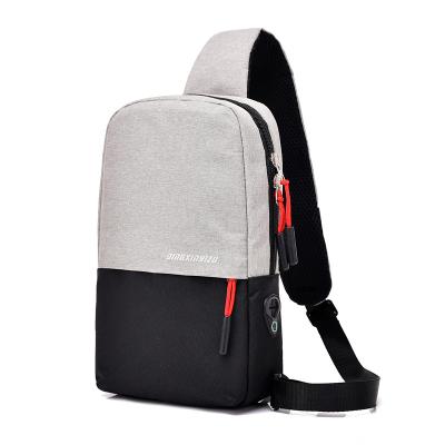 China Large Capacity Multifunctional Fashionable Waterproof Travel Lightweight Men Throw Bag With Earphone Hole for sale