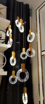 China Modern Crystal Ring Chandelier Creative Villa Hotel Restaurant Gold Pendant Light Staircase Chandeliers for sale