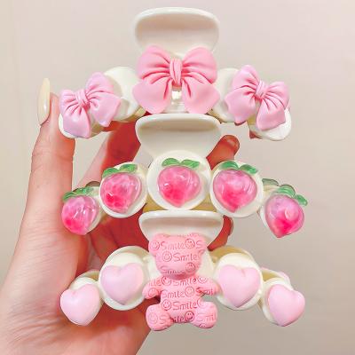 China Hair accessories wholesale cute cartoon pink hair claw pink heart bow bear hair claw big pink shark hairpin hair claw for sale