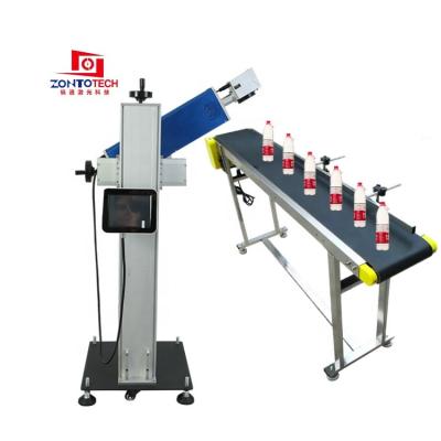 China 20W Flight Laser Marking Machine Air Cooled High Speed Online CO2 Printing Engraving Machine For Plastic Bottle Date Code Printer for sale