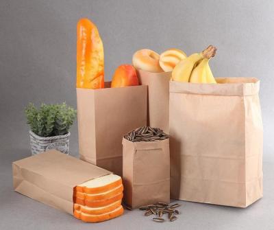 China Bolsas Kraft biodegradables duraderas para llevar sin mango Opciones ecológicas para la entrega de alimentos en venta