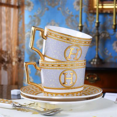 China Sustainable Mosaic Pattern Pottery Mug Ceramic Coffee Cups Set Saucer for sale