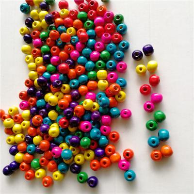 China DIY Wooden Creative Beads 1kg one bag Wholesale Environmental Natural Wood Beads Decorative Round Wooden Beads Crafts DIY Jewelry Making Home Favor for sale