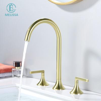 China Melissa Brass Bathroom Fashion Brushed Gold Split Cabinet Type Hot And Cold Sense Bathroom Faucets Handle Three Holes Double Basin for sale