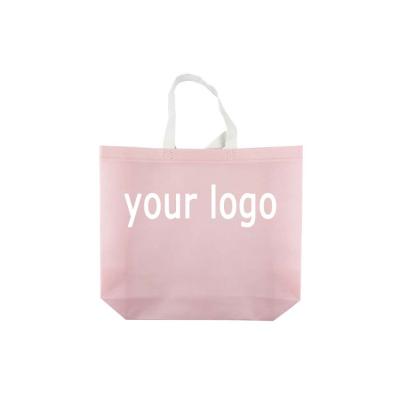 China Beautiful Moisture Proof Storage Vertical Boutique Pink Cut Non Woven Hand Carrier Food Bag for sale