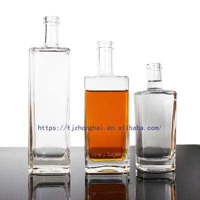 China Whiskey Whiskey Glass Bottle For 500ml 700ml Wholesale Empty Square Shape Whiskey Bottle for sale