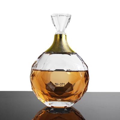 China High Quality 700ml Glass Wine Bottle With Cap For Spirits Whiskey Brandy Clear Bottle Glass for sale