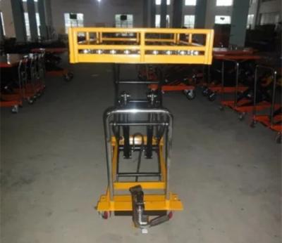 China 150KG al manual 2000KG Scissor la barandilla baja de la tabla de elevación con las bolas universales en venta