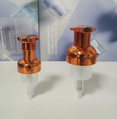 China Colorful Recyclable Mini Foam Pump Dispenser 0.4 Cc Foam Output Electroplating Colour Customized Com for sale