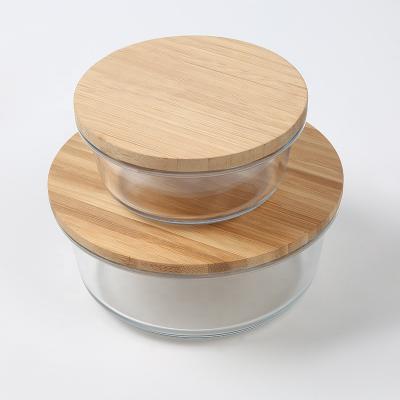China Viable Set of Round High Borosilicate 3 Lunch Box Airtight Glass Container with Bamboo Lid Heat Resistant Mixing Glass Bowl for sale