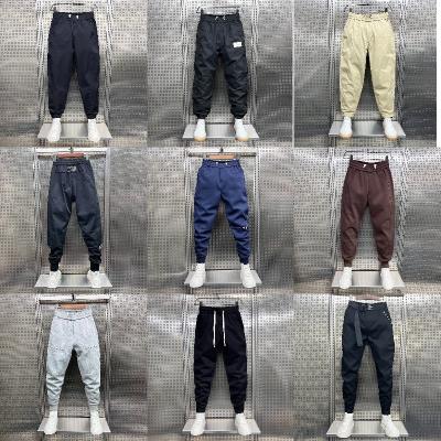 China Hot Selling Wholesale Anti-Wrinkle Wholesale Men's Casual Pants High Elasticity Customized Logo Printed Casual Pants for sale