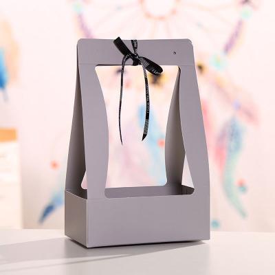China Recycled Materials Wholesale Flower Paper Bag Portable Gift Package Bag Take Away Flower Boxes For Bouquet for sale