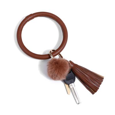 China New Promotion Gift Leather Bag Luxury Strap Key And Plush Chain Tassel Leather Ball for sale