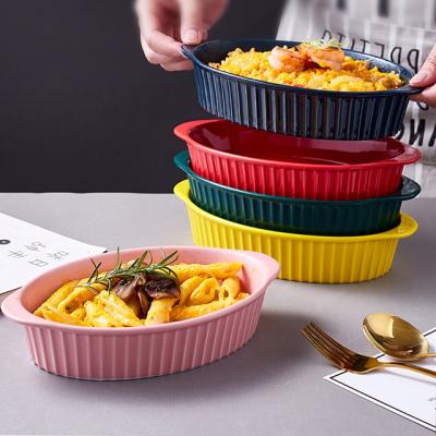 China Sustainable 9 Inch Double Handle Slug AL Shape Ceramic Bowl Single Colored Salad Baked Ceramic Rice Baking Bowl for sale