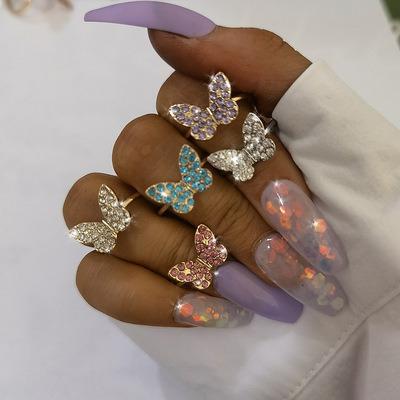 China 2021 FASHIONABLE color small color wild classical geometric simple YI butterfly ring diamond YI dingle ring woman for sale